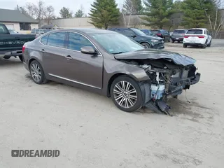2014 Kia Cadenza Premium with VIN KNALN4D74E5164291, listed as a IAAI auction lot 42013820 with 140,765 mi miles and . Bid and sale history available at DreamBid. Image 1.