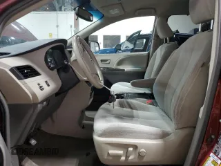 2014 Toyota Sienna LE with VIN 5TDJK3DC9ES083307, listed as a Copart auction lot 57939385 with 132,494 mi miles and Salvage title. Bid and sale history available at DreamBid. Image 7.