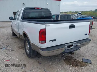 2003 Ford F-150 XL with VIN 1FTRX17L33NB79733, listed as a IAAI auction lot 42023385 with 136,236 mi miles. Bid and sale history available at carsss.com. Image 3.