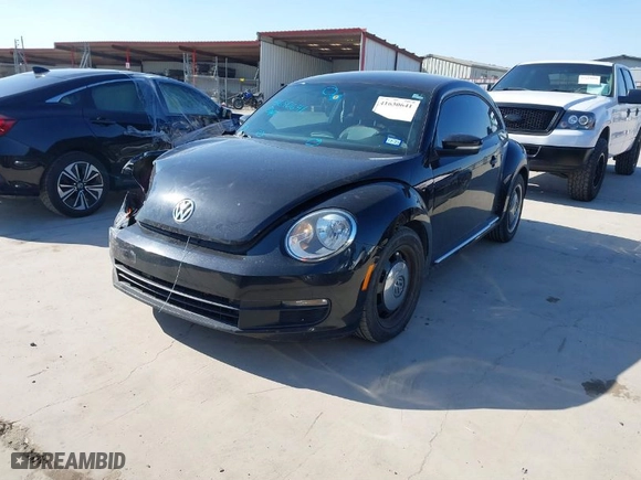 2016 Volkswagen Beetle Coupe 1.8T Wolfsburg Edition with VIN 3VWF17AT5GM638953, listed as a IAAI auction lot 41630641 with NaN miles. Bid and sale history available at carsss.com. Image 2.