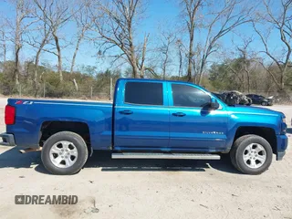 2018 Chevrolet Silverado 1500 LT with VIN 3GCUKREC9JG211391, listed as a IAAI auction lot 41710886 with 113,989 mi miles. Bid and sale history available at carsss.com. Image 13.