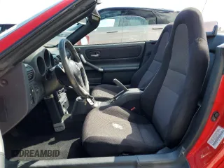 2001 Toyota MR2 z VIN JTDFR320910023955, wystawiony jako Copart lot #73781064 z przebiegiem 84 932 mil mil oraz Szkody całkowita. Historia ofert i sprzedaży dostępna na DreamBid. Obrazek 7.