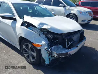 2020 Honda Civic LX z VIN 19XFC2F67LE212561, wystawiony jako IAAI lot #42272481 z przebiegiem 50 681 mil mil oraz . Historia ofert i sprzedaży dostępna na DreamBid. Obrazek 6.