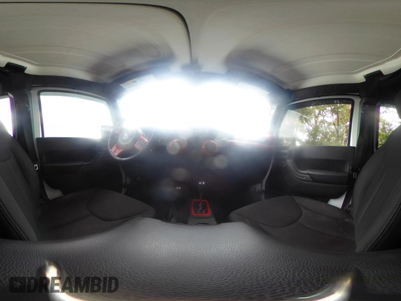 2014 Jeep Wrangler Unlimited Sport with VIN 1C4BJWDG9EL135077, listed as a IAAI auction lot 42324775 with 104,221 mi miles and . Bid and sale history available at DreamBid. Image 18.