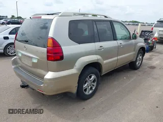 2003 Lexus GX 470 z VIN JTJBT20X930014196, wystawiony jako IAAI lot #42467486 z przebiegiem 282 962 mil mil oraz . Historia ofert i sprzedaży dostępna na DreamBid. Obrazek 4.