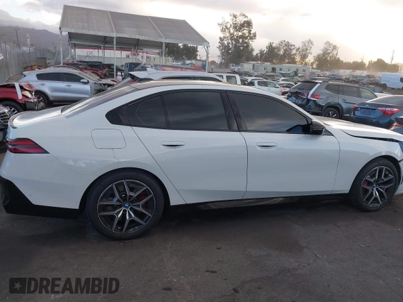 2024 BMW i5 M60 with VIN WBY43FK05RCR89416, listed as a IAAI auction lot 41263506 with 5,062 mi miles and . Bid and sale history available at DreamBid. Image 13.