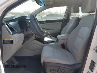 2018 Hyundai Tucson SEL z VIN KM8J33A46JU665618, wystawiony jako Copart lot #53329305 z przebiegiem 146 486 mil mil oraz Szkoda całkowita • Salvage title. Historia ofert i sprzedaży dostępna na DreamBid. Obrazek 7.