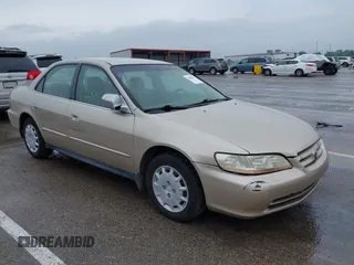 2002 Honda Accord LX z VIN JHMCG56402C025464, wystawiony jako IAAI lot #42458693 z przebiegiem 257 711 mil mil oraz . Historia ofert i sprzedaży dostępna na DreamBid. Obrazek 1.