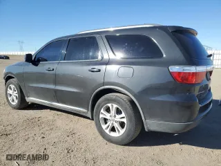 2011 Dodge Durango Crew with VIN 1D4RD4GGXBC634085, listed as a Copart auction lot 88554025 with 209,872 mi miles and Salvage Title. Bid and sale history available at carsss.com. Image 2.