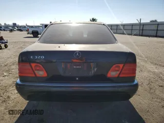 1998 Mercedes-Benz E-Class with VIN WDBJF65F4WA646422, listed as a Copart auction lot 88982785 with 281,524 mi miles and Salvage Title. Bid and sale history available at carsss.com. Image 6.