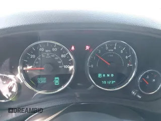 2014 Jeep Wrangler Unlimited Sahara with VIN 1C4BJWEG0EL306202, listed as a IAAI auction lot 41784330 with 79,123 mi miles. Bid and sale history available at carsss.com. Image 7.