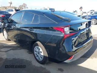 2020 Toyota Prius L Eco z VIN JTDKARFU6L3104385, wystawiony jako IAAI lot #41922029 z przebiegiem 123 235 mil mil oraz . Historia ofert i sprzedaży dostępna na DreamBid. Obrazek 3.