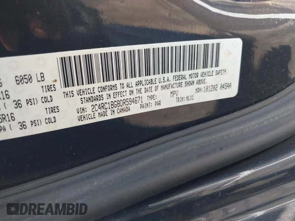 2013 Chrysler Town & Country Touring with VIN 2C4RC1BG8DR594671, listed as a IAAI auction lot 42039026 with 208,909 mi miles. Bid and sale history available at carsss.com. Image 9.