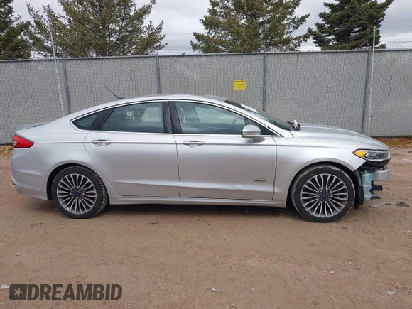 2017 Ford Fusion Titanium with VIN 3FA6P0SU2HR153423, listed as a IAAI auction lot 42029438 with 106,596 mi miles and . Bid and sale history available at DreamBid. Image 13.