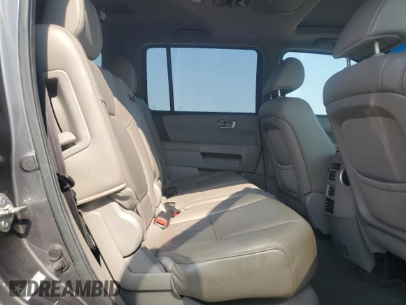 2012 Honda Pilot EX-L with VIN 5FNYF4H66CB084493, listed as a Copart auction lot 59683655 with 112,477 mi miles and Salvage title. Bid and sale history available at DreamBid. Image 11.