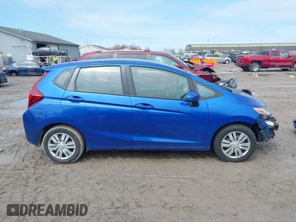 2015 Honda Fit LX with VIN 3HGGK5H52FM710434, listed as a IAAI auction lot 42022022 with 104,118 mi miles. Bid and sale history available at carsss.com. Image 14.