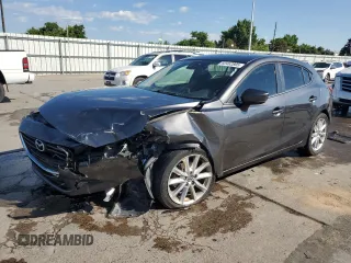2017 Mazda 3 Touring with VIN JM1BN1L7XH1116112, listed as a Copart auction lot 60462805 with 112,159 mi miles and Salvage title. Bid and sale history available at DreamBid. Image 1.