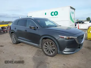 2016 Mazda CX-9 Signature with VIN JM3TCBEY7G0112486, listed as a IAAI auction lot 41592723 with 91,392 mi miles and . Bid and sale history available at carsss.com. Image 1.