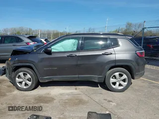 2018 Jeep Compass Altitude with VIN 3C4NJDBB6JT239565, listed as a IAAI auction lot 42219401 with 85,013 mi miles and . Bid and sale history available at DreamBid. Image 14.