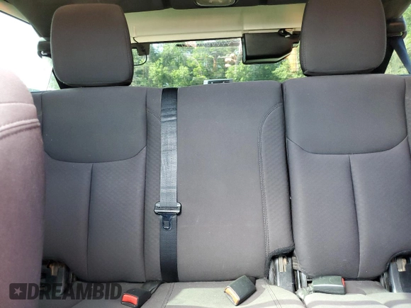 2015 Jeep Wrangler Unlimited Sport with VIN 1C4BJWDG1FL683558, listed as a Copart auction lot 59883545 with 107,267 mi miles and Salvage title. Bid and sale history available at DreamBid. Image 10.