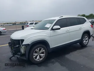 2018 Volkswagen Atlas S z VIN 1V2AP2CA7JC599090, wystawiony jako IAAI lot #42419230 z przebiegiem 81 176 mil mil oraz . Historia ofert i sprzedaży dostępna na DreamBid. Obrazek 18.
