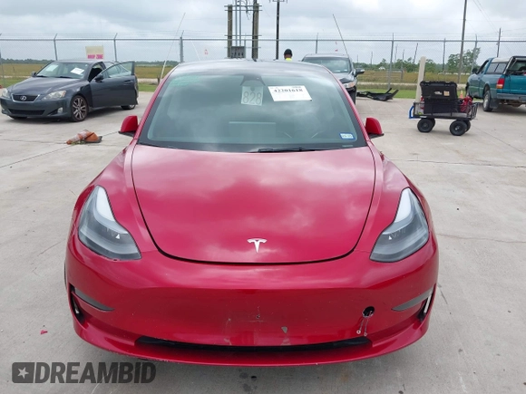 2023 Tesla Model 3 with VIN 5YJ3E1EA0PF455058, listed as a IAAI auction lot 42201618 with 31,147 mi miles and . Bid and sale history available at DreamBid. Image 6.