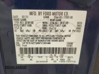 2011 Ford F-150 XL with VIN 1FTFX1ET2BFC30346, listed as a Copart auction lot 59801175 with 215,924 mi miles and Salvage title. Bid and sale history available at DreamBid. Image 12.