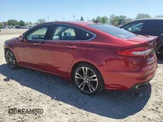 2019 Ford Fusion Titanium with VIN 3FA6P0D91KR205463, listed as a Copart auction lot 54764795 with 105,719 mi miles and Salvage title. Bid and sale history available at DreamBid. Image 2.