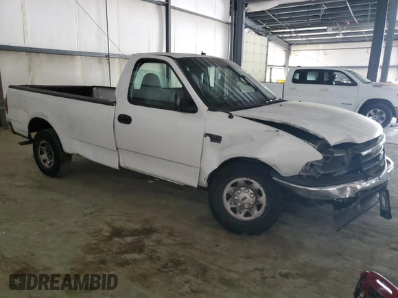 2000 Ford F-150 XL с VIN 1FTPF17L1YKA92061, выставлен на аукционе Copart как лот 66962304 с пробегом Не указан миль и Списание • Salvage title. История ставок и продаж доступна на DreamBid. Изображение 4.