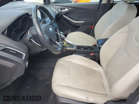 2016 Ford Focus Titanium with VIN 1FADP3J29GL223778, listed as a Copart auction lot 66171735 with Not provided miles and Salvage title. Bid and sale history available at DreamBid. Image 7.