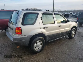 2002 Ford Escape XLS Choice with VIN 1FMYU01162KC61229, listed as a Copart auction lot 41985085 with 74,203 mi miles and Salvage title. Bid and sale history available at DreamBid. Image 3.