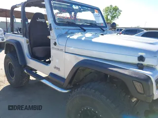 2002 Jeep Wrangler X with VIN 1J4FA39S42P763835, listed as a IAAI auction lot 42302645 with 233,634 mi miles and . Bid and sale history available at DreamBid. Image 6.