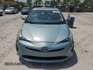 2017 Toyota Prius Two z VIN JTDKARFUXH3040343, wystawiony jako Copart lot #57870425 z przebiegiem 59 711 mil mil oraz Szkoda całkowita • Salvage title. Historia ofert i sprzedaży dostępna na DreamBid. Obrazek 5.
