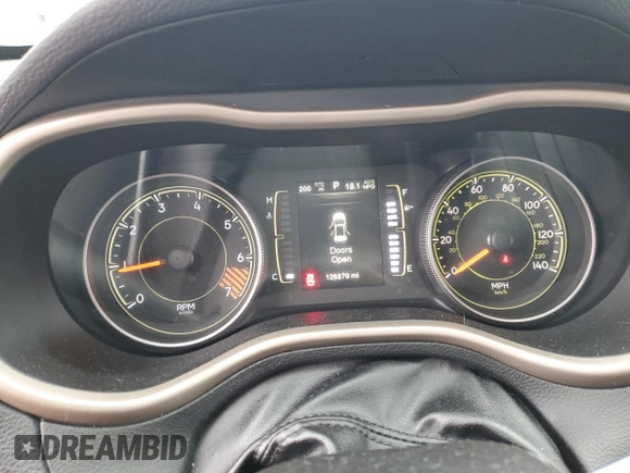 2015 Jeep Cherokee North with VIN 1C4PJMCB2FW594225, listed as a Copart auction lot 80424404 with 126,879 mi miles and Salvage Title. Bid and sale history available at carsss.com. Image 9.