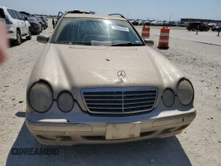 2003 Mercedes-Benz E-Class AWD with VIN WDBJH82J93X088042, listed as a Copart auction lot 70566864 with 167,374 mi miles and Salvage Title. Bid and sale history available at carsss.com. Image 5.