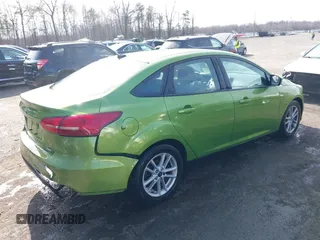 2018 Ford Focus SE with VIN 1FADP3FE7JL237818, listed as a IAAI auction lot 41729205 with 66,702 mi miles. Bid and sale history available at carsss.com. Image 4.