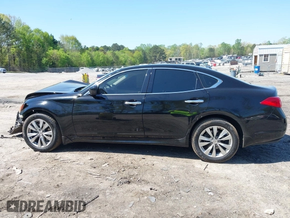 2012 Infiniti M with VIN JN1BY1AR1CM392880, listed as a IAAI auction lot 42012317 with 106,000 mi miles and . Bid and sale history available at DreamBid. Image 13.