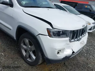 2013 Jeep Grand Cherokee Limited with VIN 1C4RJFBT0DC619216, listed as a IAAI auction lot 41703137 with 142,577 mi miles. Bid and sale history available at carsss.com. Image 6.