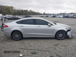 2016 Ford Fusion SE with VIN 3FA6P0H97GR258850, listed as a IAAI auction lot 41838546 with 124,244 mi miles and . Bid and sale history available at carsss.com. Image 13.