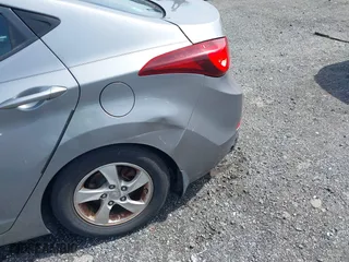 2015 Hyundai Elantra Limited with VIN KMHDH4AE2FU329517, listed as a IAAI auction lot 41951396 with 193,600 mi miles. Bid and sale history available at carsss.com. Image 6.