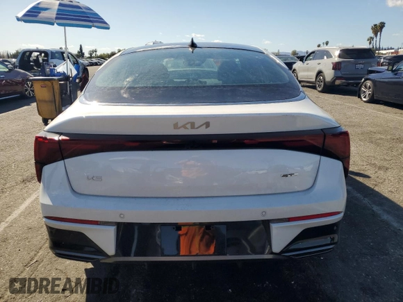 2025 Kia K5 GT-Line with VIN KNAG64J75S5304637, listed as a Copart auction lot 47424955 with 4,823 mi miles and Salvage Title. Bid and sale history available at carsss.com. Image 6.
