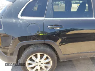 2014 Jeep Cherokee Limited with VIN 1C4PJMDB9EW210180, listed as a IAAI auction lot 41302037 with 75,177 mi miles and . Bid and sale history available at DreamBid. Image 6.