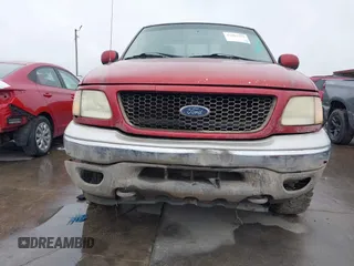 2003 Ford F-150 XL with VIN 2FTPX18LX3CA89961, listed as a IAAI auction lot 41901357 with 199,708 mi miles. Bid and sale history available at carsss.com. Image 16.
