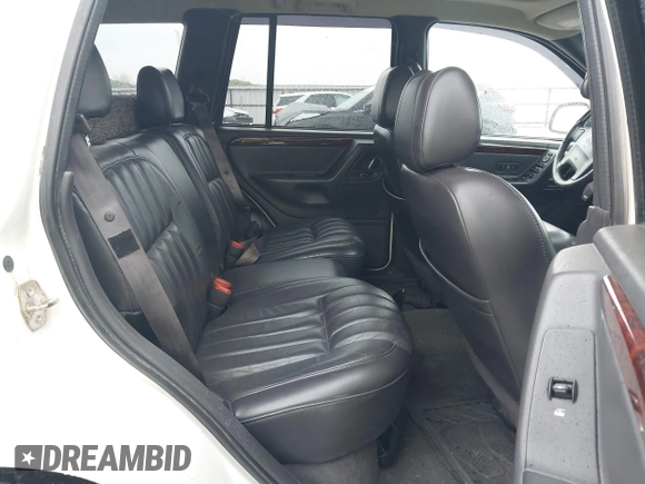 2000 Jeep Grand Cherokee Limited with VIN 1J4GW58N8YC336316, listed as a IAAI auction lot 42409398 with 168,230 mi miles and . Bid and sale history available at DreamBid. Image 8.