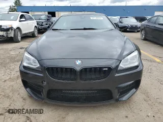 2015 BMW M6 z VIN WBSLX9C57FD160701, wystawiony jako Copart lot #57118924 z przebiegiem 60 271 mil mil oraz Tytuł czysty. Historia ofert i sprzedaży dostępna na DreamBid. Obrazek 5.