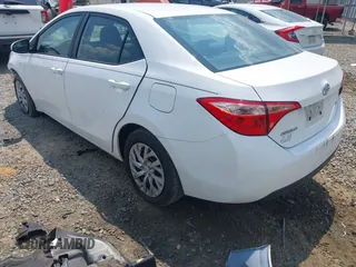 2018 Toyota Corolla L with VIN 2T1BURHE3JC988786, listed as a IAAI auction lot 42597734 with 88,016 mi miles and . Bid and sale history available at DreamBid. Image 3.
