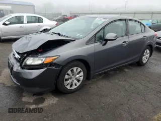 2012 Honda Civic LX z VIN 2HGFB2F50CH324974, wystawiony jako Copart lot #57442305 z przebiegiem 124 462 mil mil oraz Szkoda całkowita • Salvage title. Historia ofert i sprzedaży dostępna na DreamBid. Obrazek 1.