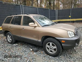 2001 Hyundai Santa Fe GLS with VIN KM8SC83D71U084837, listed as a Copart auction lot 77588984 with 102,585 mi miles and Salvage Title. Bid and sale history available at carsss.com. Image 4.