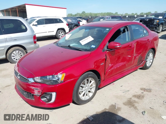 2016 Mitsubishi Lancer ES z VIN JA32U2FU3GU001857, wystawiony jako IAAI lot #41999674 z przebiegiem 65 520 mil mil oraz . Historia ofert i sprzedaży dostępna na DreamBid. Obrazek 17.