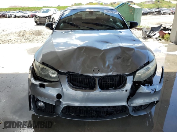 2011 BMW 3 Series 335is with VIN WBAKG1C52BE617713, listed as a Copart auction lot 74064204 with 132,742 mi miles and Salvage Title. Bid and sale history available at carsss.com. Image 5.